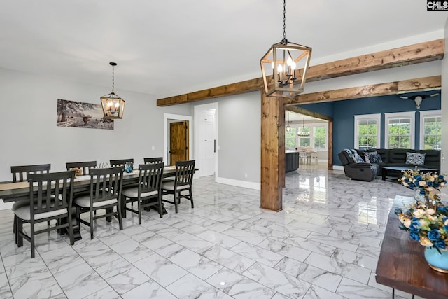 dining area with baseboards, marble finish floor, and a notable chandelier