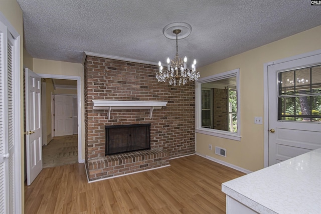 406 White Falls Dr, Columbia, SC 29212 - unfurnished dining area with an inviting chandelier, baseboards, light wood finished floors, and visible vents