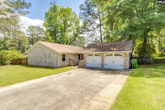 1916 Chandler Ave, Columbia, SC 29210 - ranch-style house featuring fence, an attached garage, concrete driveway, and a front lawn