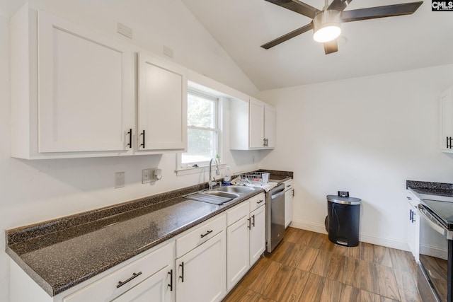 1916 Chandler Ave, Columbia, SC 29210 - kitchen featuring ceiling fan, a sink, black electric range, stainless steel dishwasher, and vaulted ceiling