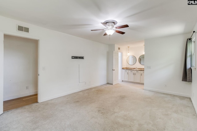 1916 Chandler Ave, Columbia, SC 29210 - unfurnished living room with ceiling fan, visible vents, light carpet, and baseboards