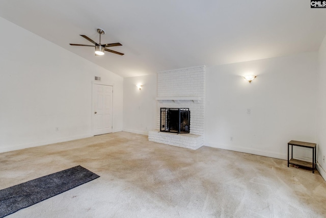1916 Chandler Ave, Columbia, SC 29210 - unfurnished living room featuring light colored carpet, a fireplace, a ceiling fan, vaulted ceiling, and visible vents