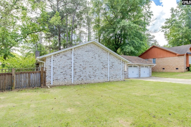 1916 Chandler Ave, Columbia, SC 29210 - exterior space with driveway, a garage, brick siding, fence, and a yard