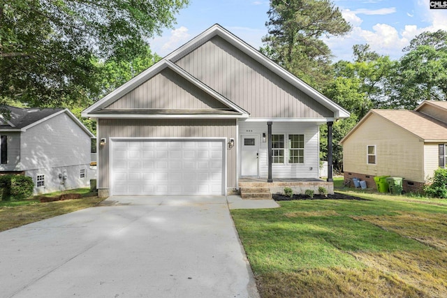 view of front of home with a garage, covered porch, a front yard, and concrete driveway