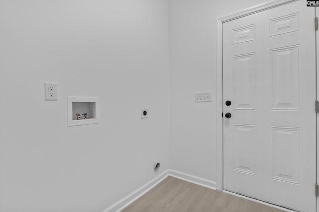 laundry area featuring washer hookup, laundry area, electric dryer hookup, light wood-type flooring, and baseboards