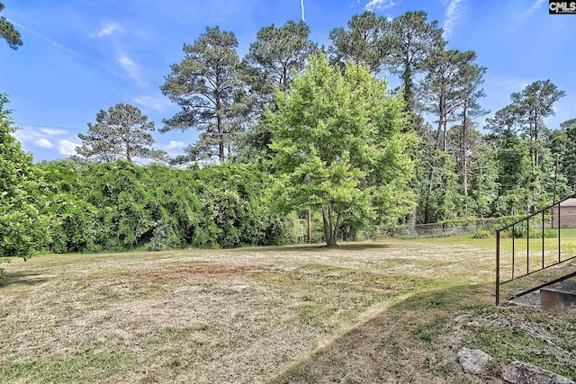 view of yard featuring fence