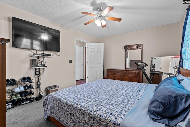 bedroom with carpet floors and a ceiling fan