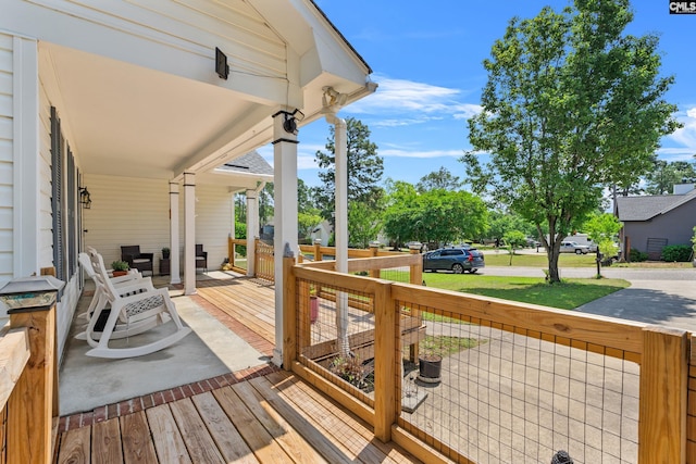 deck featuring covered porch