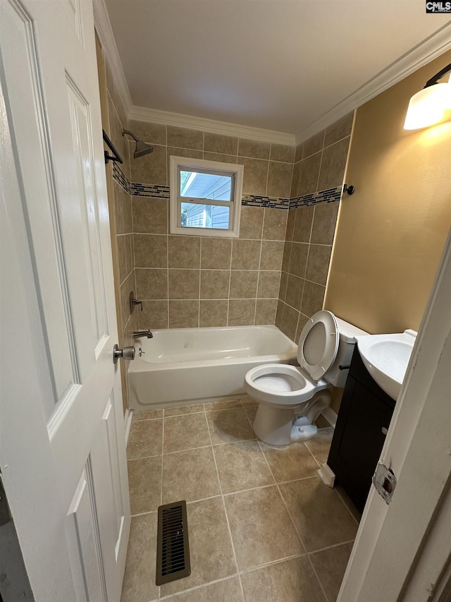 bathroom with crown molding, toilet,  shower combination, and visible vents