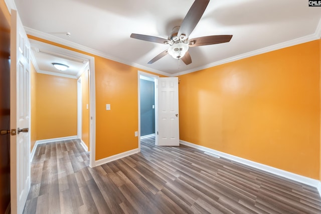 unfurnished room with ornamental molding, wood finished floors, baseboards, and ceiling fan