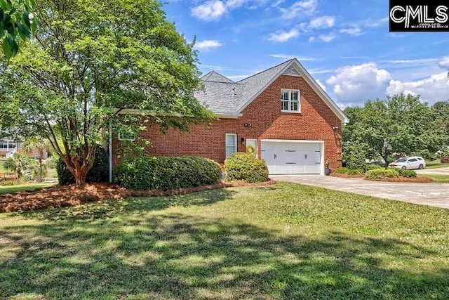 121 Cove View Dr, Irmo, SC 29063 - traditional home with brick siding, a garage, driveway, and a front yard