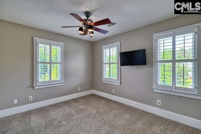 121 Cove View Dr, Irmo, SC 29063 - carpeted spare room featuring baseboards, a ceiling fan, a textured ceiling, and visible vents