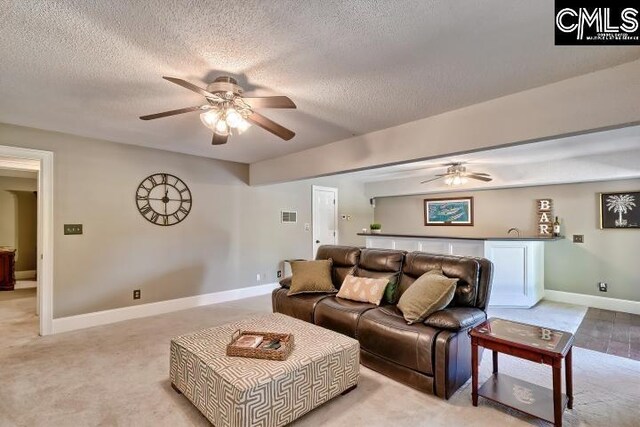 121 Cove View Dr, Irmo, SC 29063 - living room with baseboards, ceiling fan, and a textured ceiling