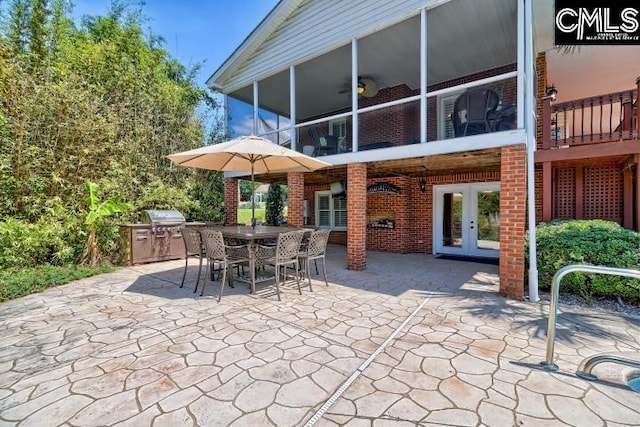 121 Cove View Dr, Irmo, SC 29063 - view of patio / terrace featuring french doors, outdoor dining space, a sunroom, and grilling area