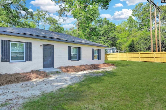 2723 Dubard St, Columbia, SC 29204 - exterior space featuring a yard, brick siding, and fence