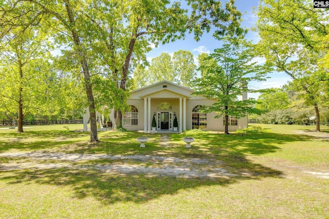 view of front of property with a front lawn