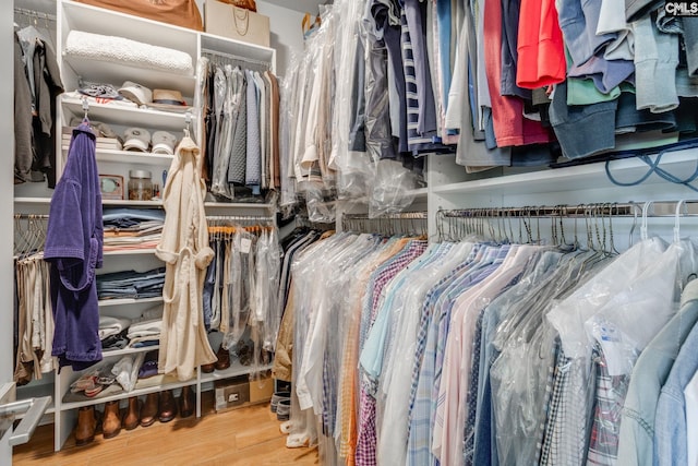spacious closet with wood finished floors