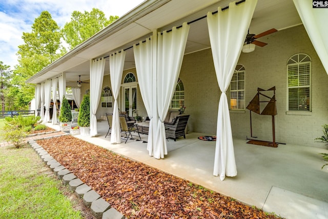 view of patio / terrace with a ceiling fan