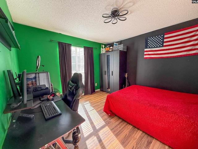 10 Mystic Way Dr, Columbia, SC 29229 - bedroom with a textured ceiling, wood finished floors, and an office area