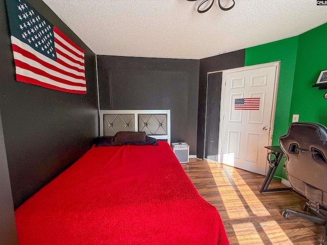 10 Mystic Way Dr, Columbia, SC 29229 - bedroom with wood finished floors and a textured ceiling