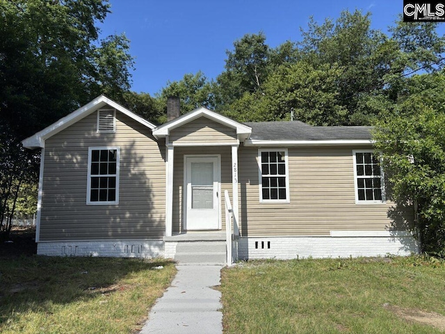 2813 Truman St, Columbia, SC 29204 - manufactured / mobile home with a front lawn and a chimney