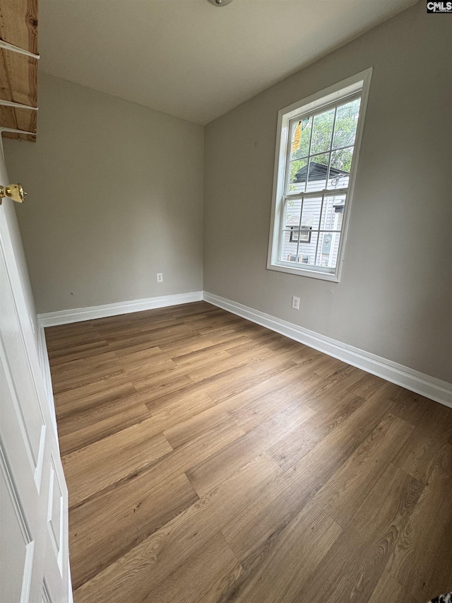 2813 Truman St, Columbia, SC 29204 - unfurnished room featuring wood finished floors and baseboards
