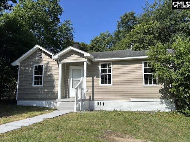 2813 Truman St, Columbia, SC 29204 - manufactured / mobile home featuring a front lawn and a chimney