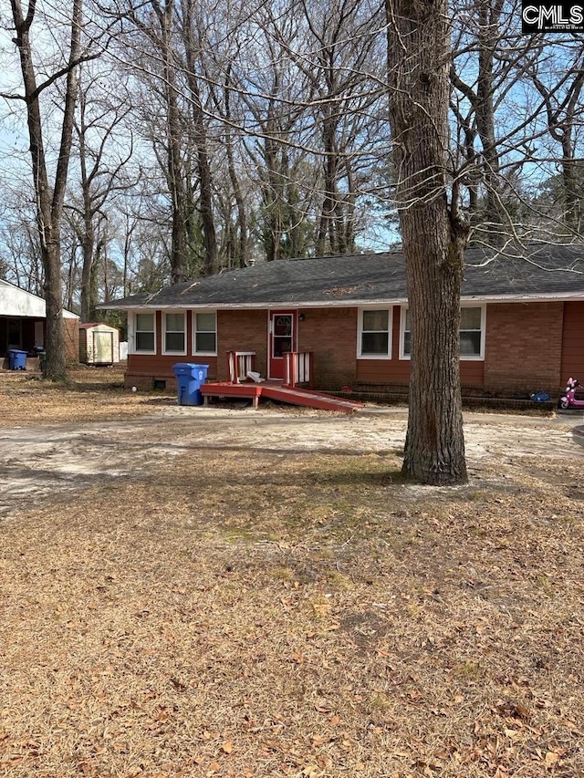 3116 Truman St, Columbia, SC 29204 - rear view of property with a wooden deck