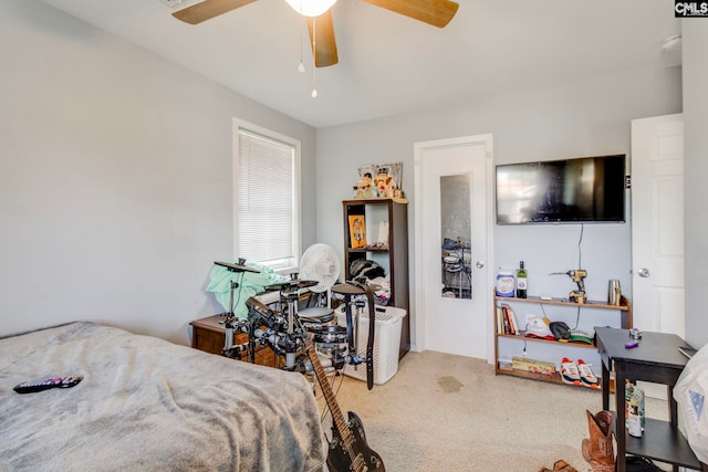 bedroom featuring carpet and a ceiling fan