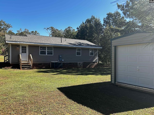 629 Crystal Creek Cir, Chapin, SC 29036 - back of house featuring a lawn, a garage, crawl space, entry steps, and roof with shingles