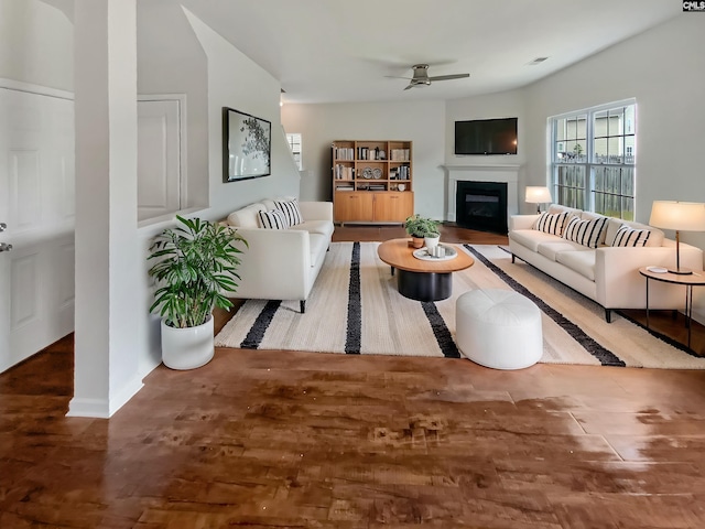 320 Southbrook Dr, Lexington, SC 29073 - living room with baseboards, a glass covered fireplace, ceiling fan, and wood finished floors
