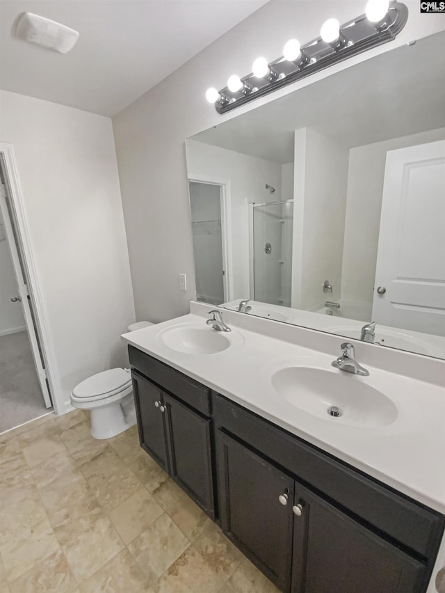 320 Southbrook Dr, Lexington, SC 29073 - bathroom featuring a sink, double vanity, toilet, and a shower stall