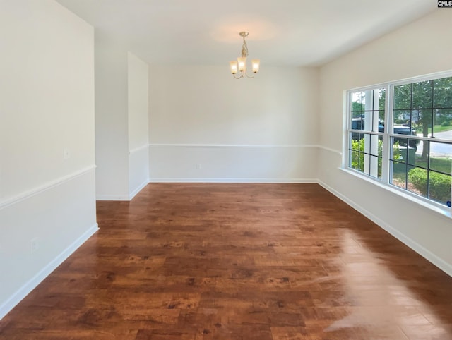 320 Southbrook Dr, Lexington, SC 29073 - unfurnished dining area with baseboards, an inviting chandelier, and dark wood-type flooring