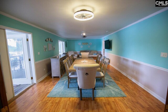 2081 Great N Rd, Winnsboro, SC 29180 - dining space featuring crown molding, baseboards, and light wood-style floors