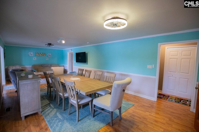 2081 Great N Rd, Winnsboro, SC 29180 - dining area featuring ornamental molding, baseboards, visible vents, and wood finished floors