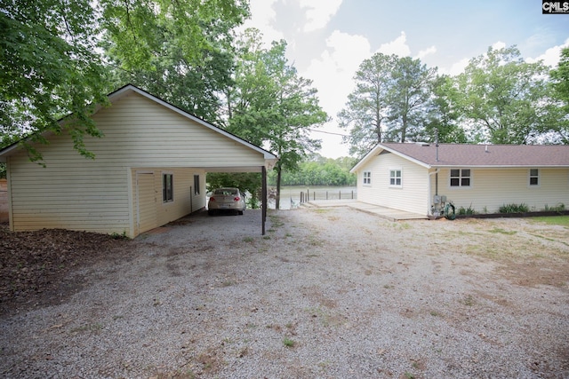 2081 Great N Rd, Winnsboro, SC 29180 - view of side of property featuring driveway and an attached carport