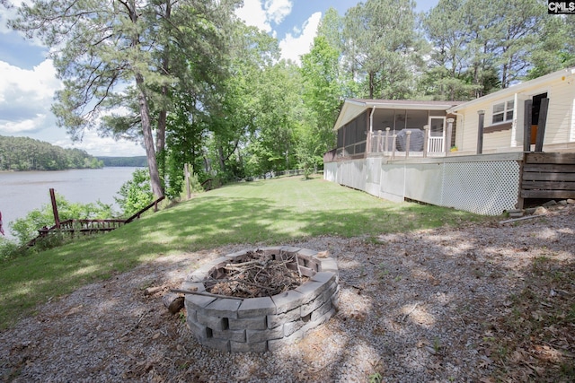 2081 Great N Rd, Winnsboro, SC 29180 - view of yard with a sunroom, a fire pit, and a deck with water view