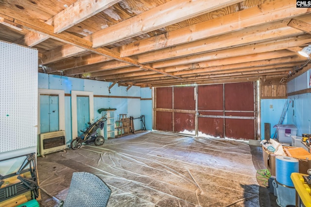 interior space featuring heating unit
