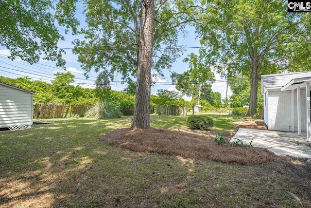 view of yard with fence