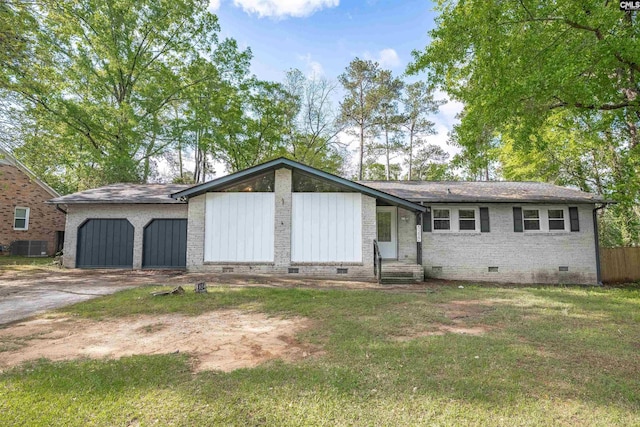 5227 Bush River Rd, Columbia, SC 29212 - view of front facade with crawl space, entry steps, concrete driveway, brick siding, and an attached garage