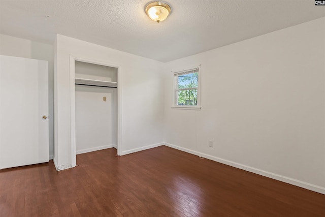 5227 Bush River Rd, Columbia, SC 29212 - unfurnished bedroom featuring wood finished floors, baseboards, and a closet