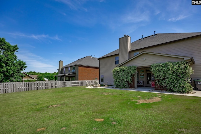 view of yard with fence