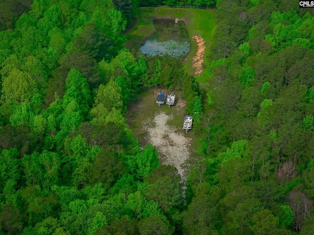aerial view featuring a forest view