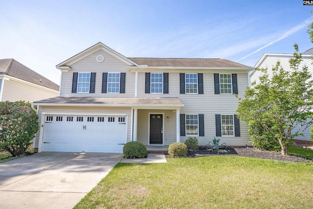 traditional-style house with a front lawn, concrete driveway, and an attached garage