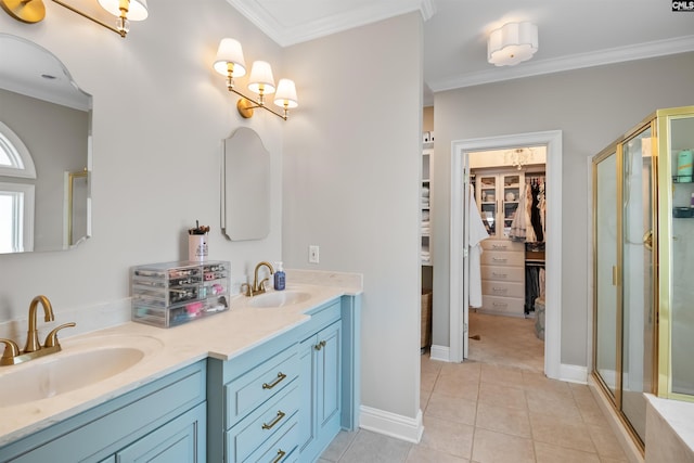 bathroom featuring a sink, crown molding, and a stall shower