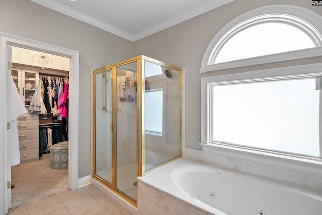 bathroom with a jetted tub, a stall shower, a walk in closet, tile patterned flooring, and ornamental molding