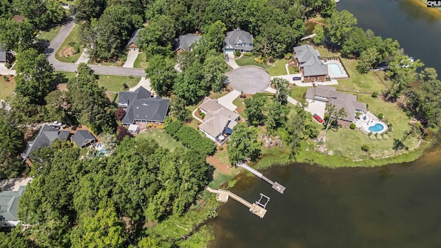 bird's eye view featuring a water view and a residential view