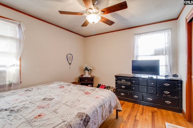 2700 Magnolia St, Columbia, SC 29204 - bedroom featuring a ceiling fan, crown molding, and light wood-type flooring