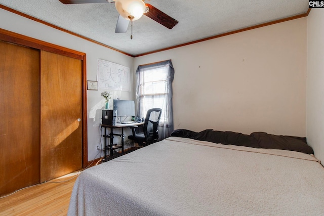 2700 Magnolia St, Columbia, SC 29204 - bedroom with ceiling fan, a textured ceiling, wood finished floors, and ornamental molding