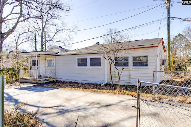 2700 Magnolia St, Columbia, SC 29204 - view of front facade with driveway, roof with shingles, and fence